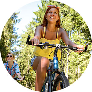 Woman riding Bicycle for Body Health