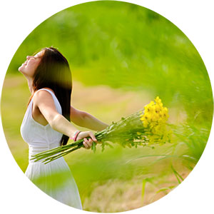 Female in field with flowers