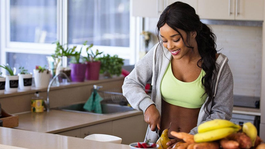 Woman cutting vegetables